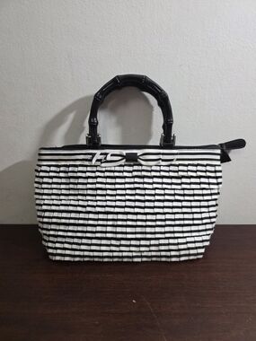 Braciano black and white striped fabric ruffle handbag with a bamboo handle